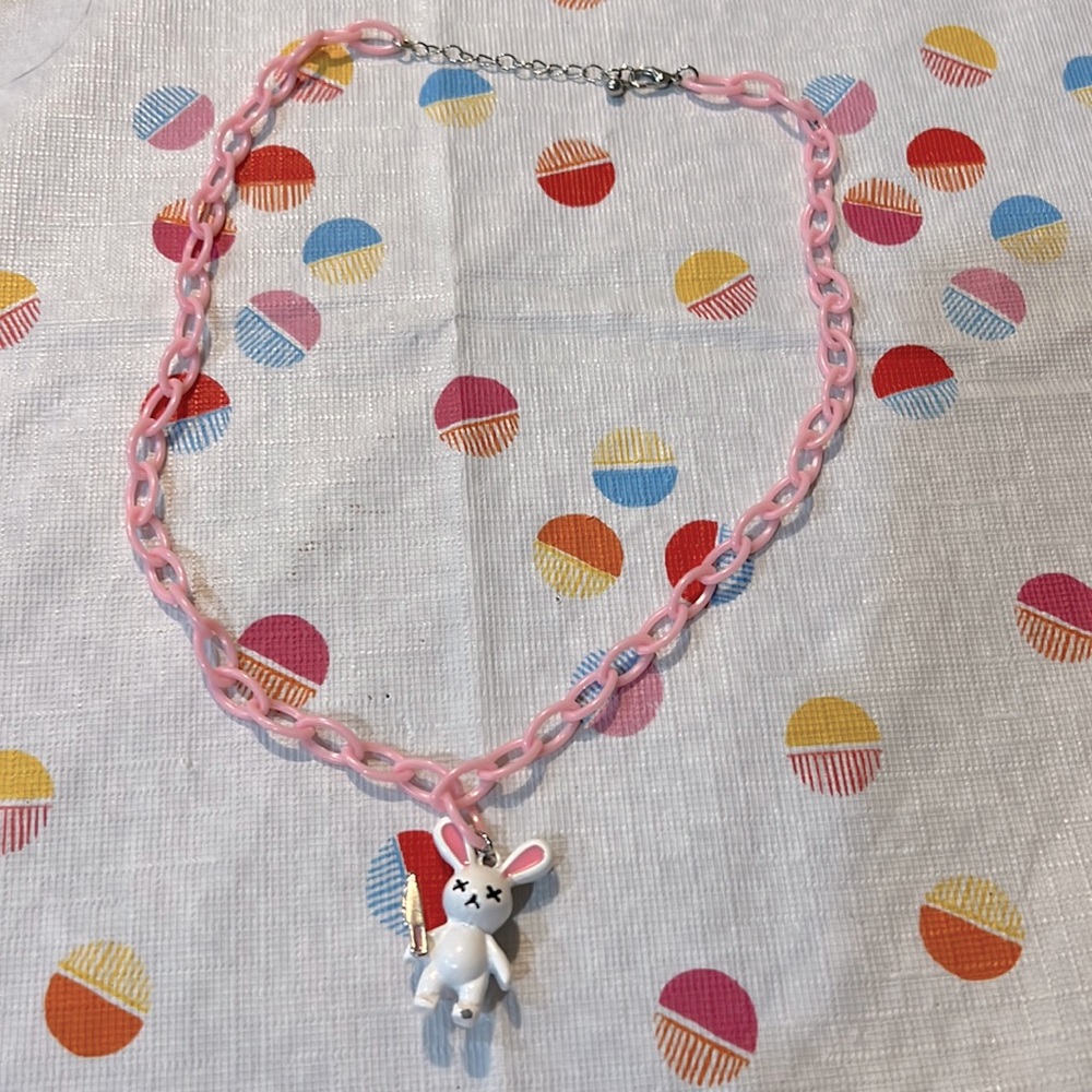 Pink chain bunny with a knife necklace